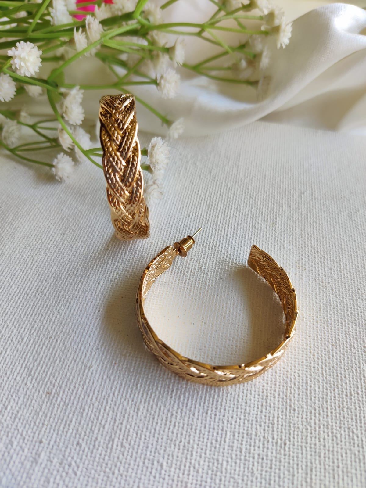 Golden hoops earring